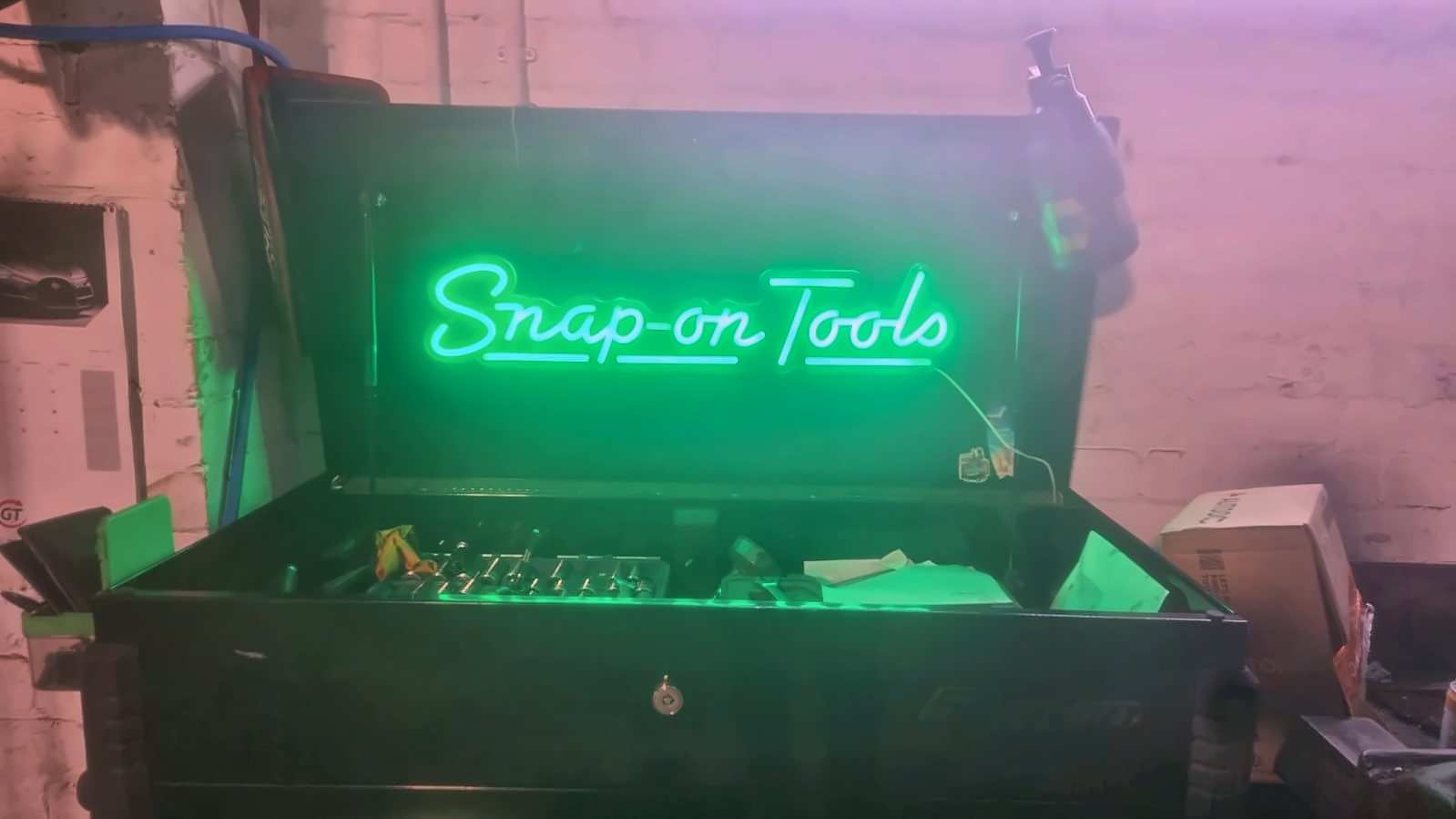 Snap-on toolbox with a green neon Snap-on Tools sign